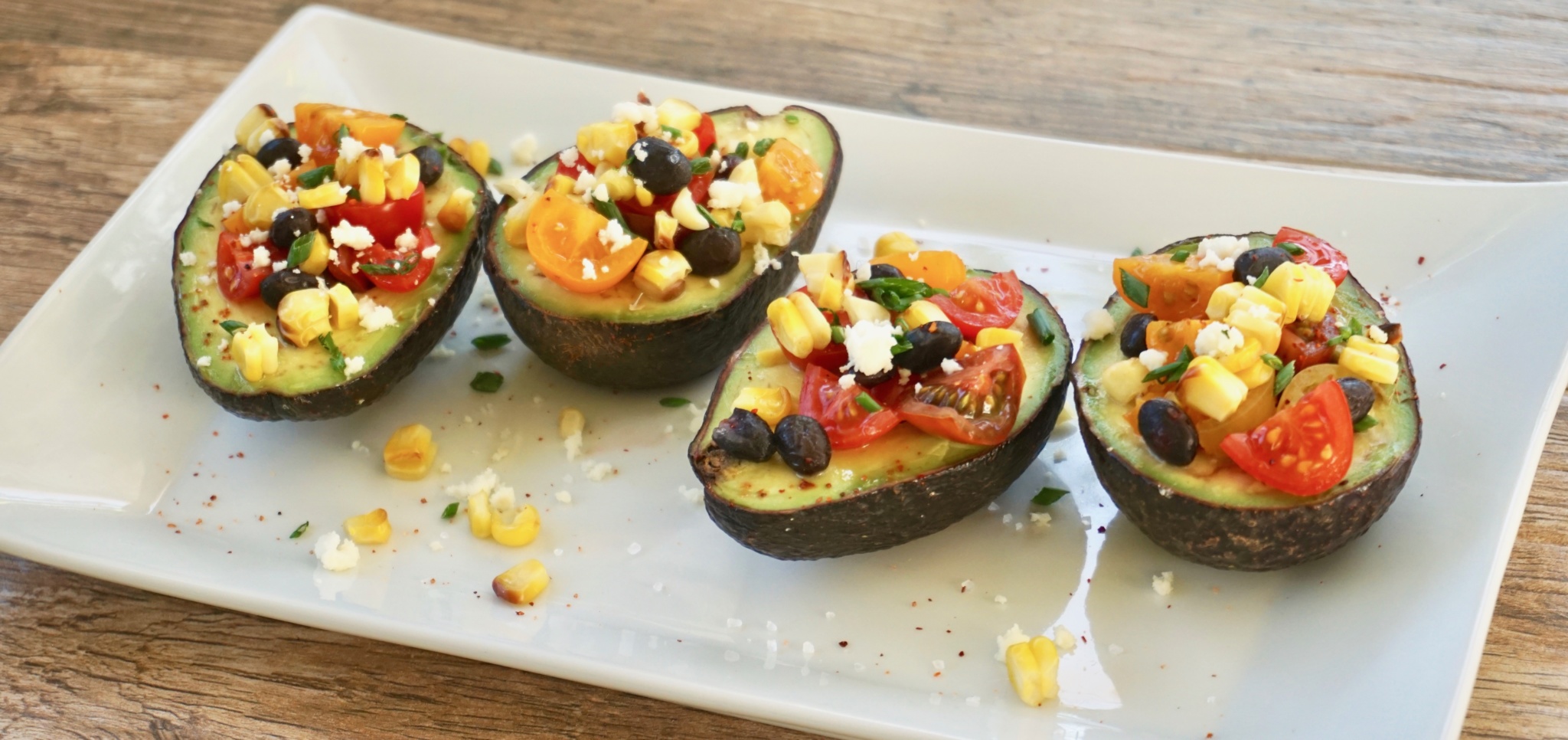 Southwest tomato salad stuffed avocados