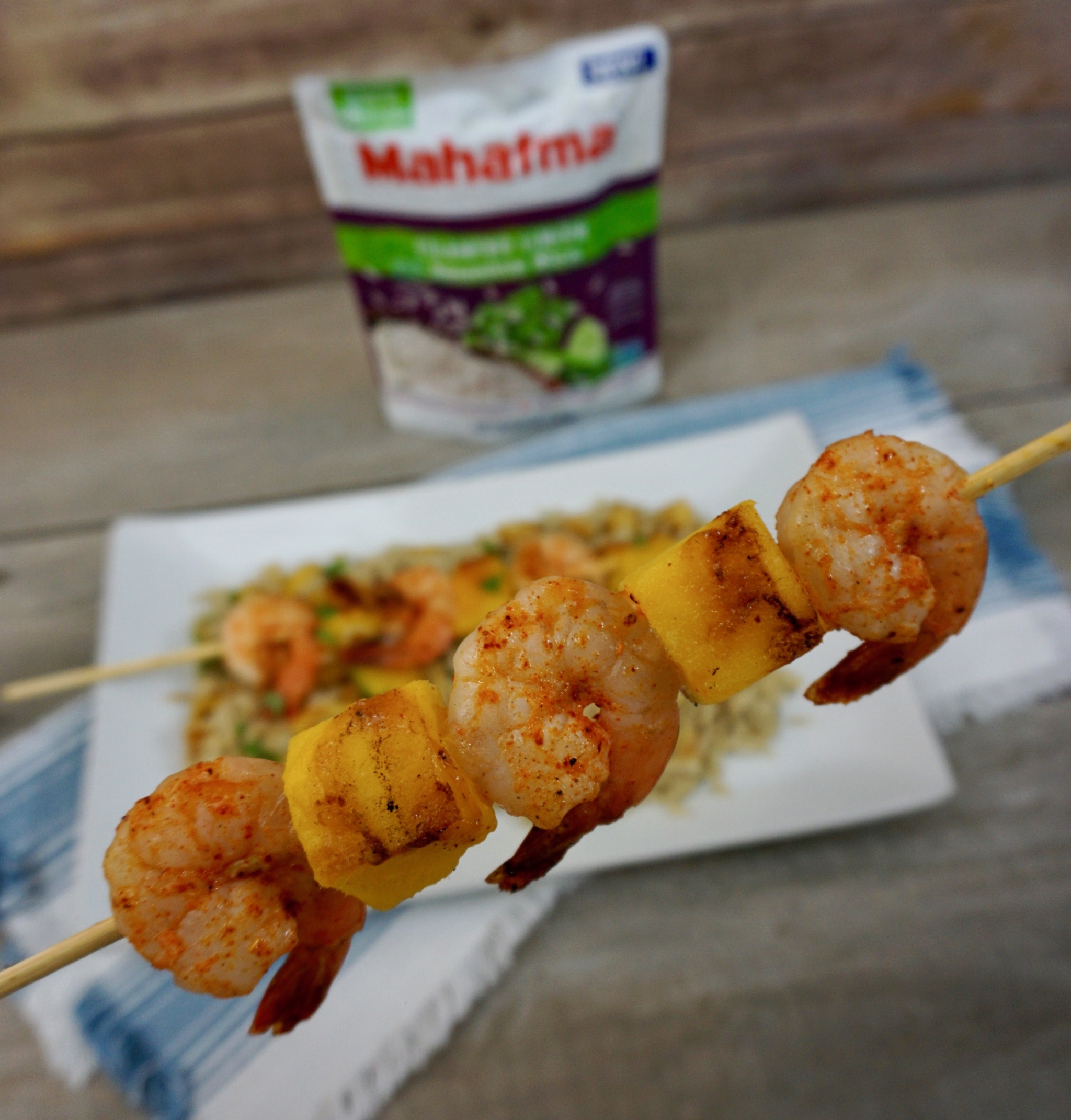Shrimp and Mango Skewers Over Grilled Pineapple Cilantro Lime Rice 