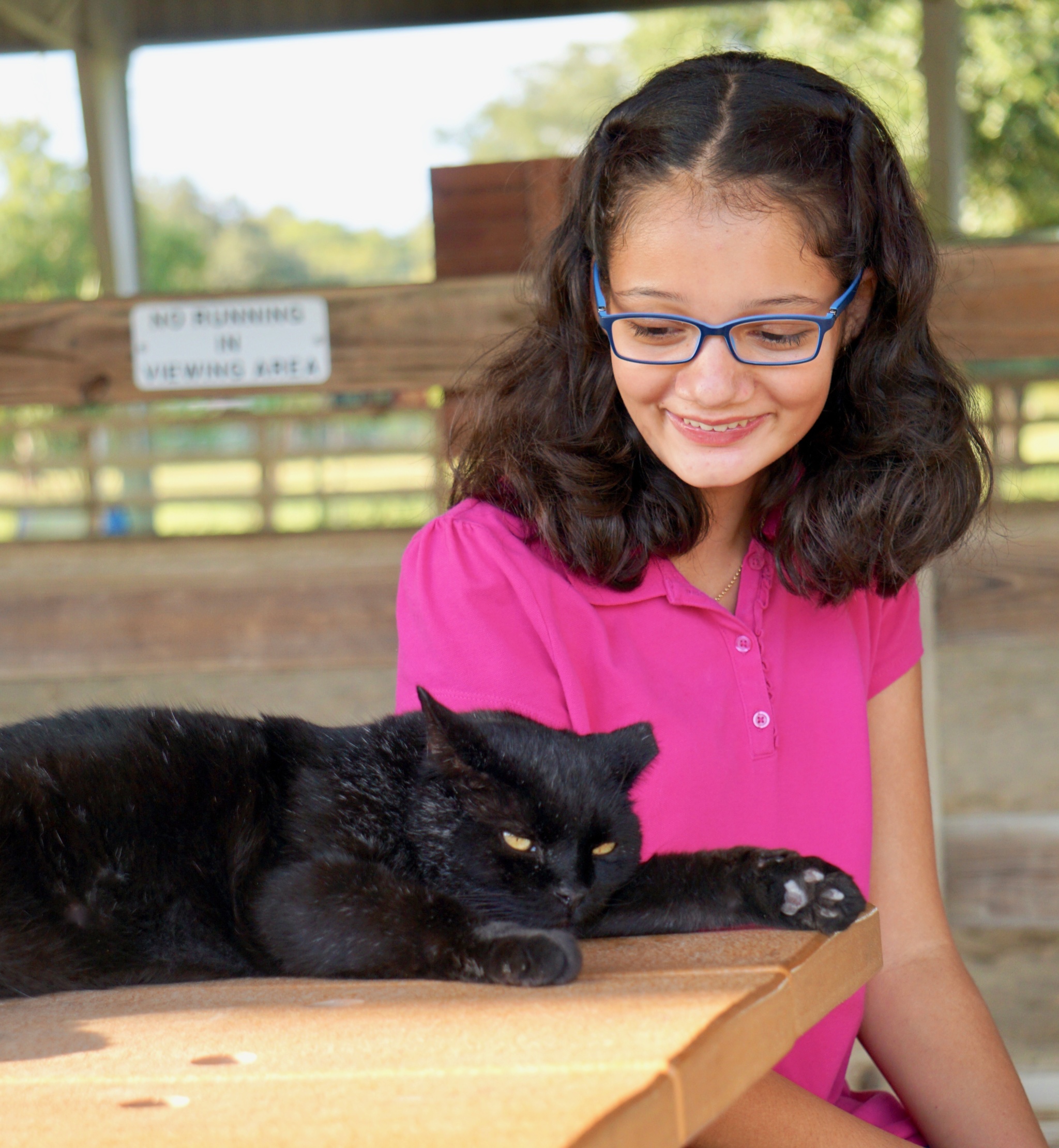 teen girl with cat