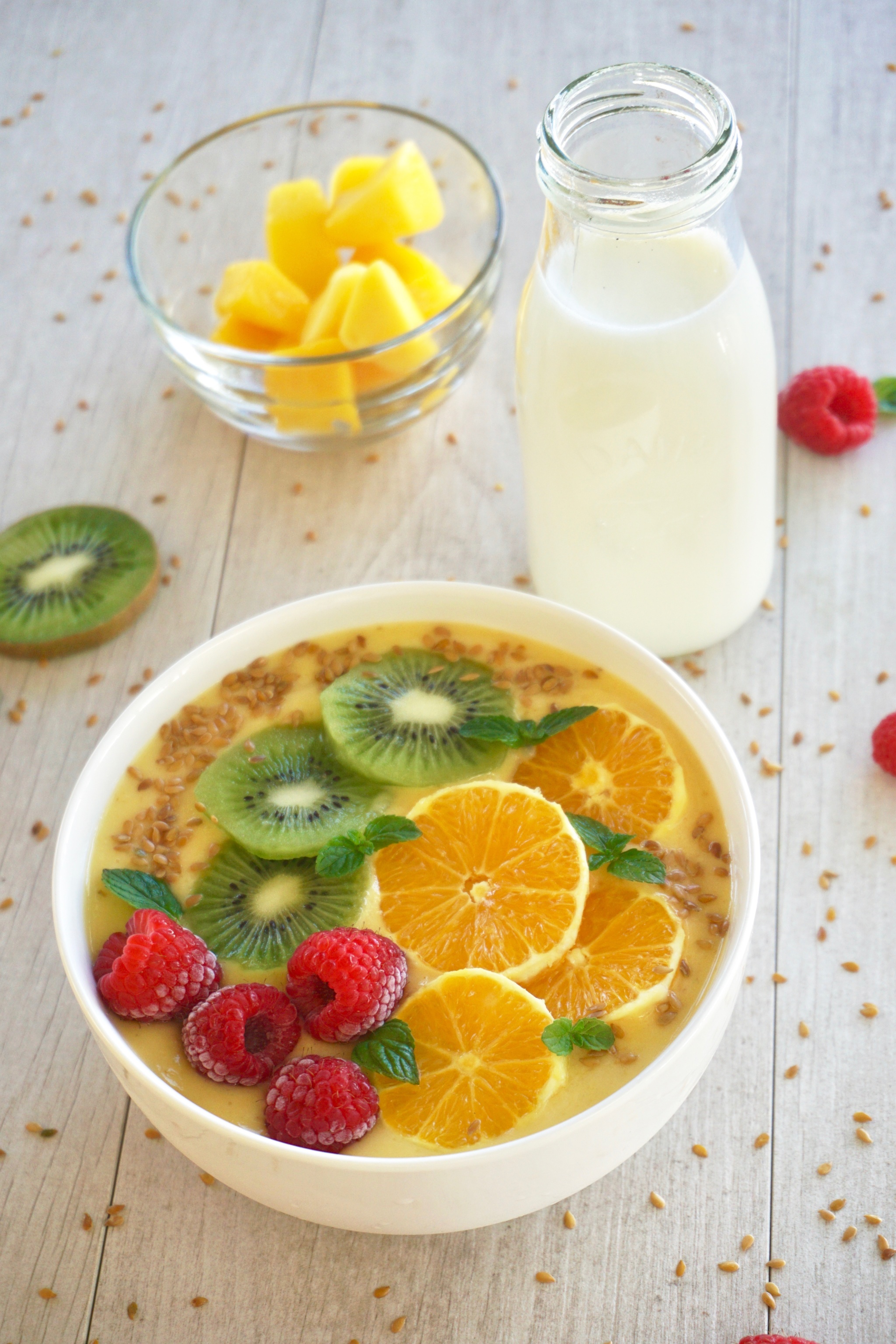 mango and orange protein smoothie bowl