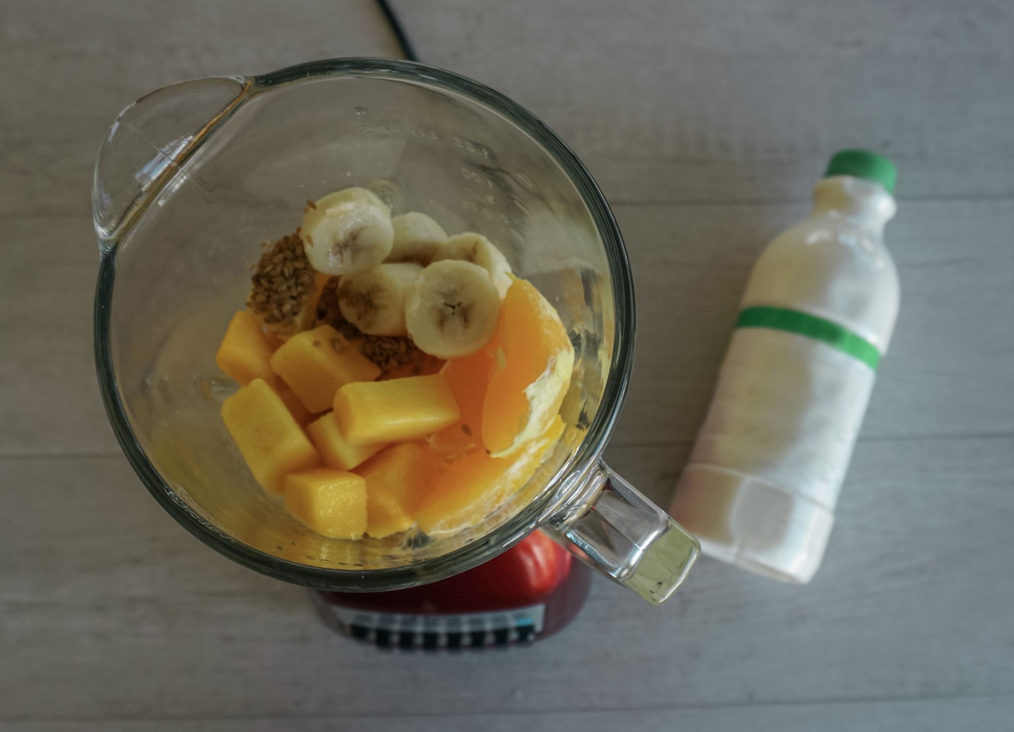 high protein orange and mango smoothie bowl