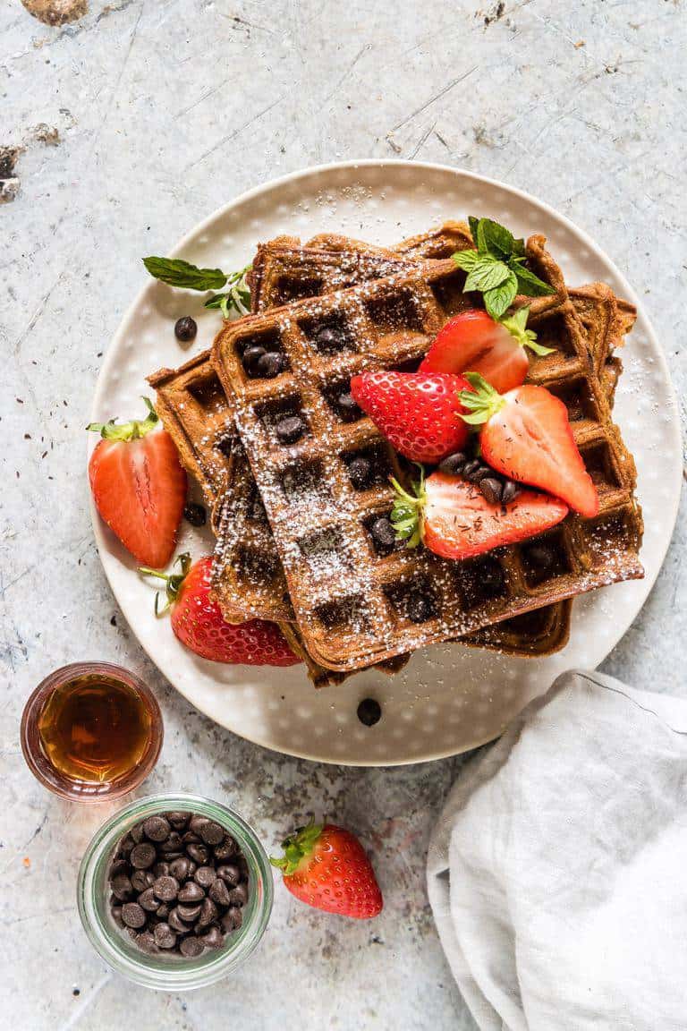 chocolate chip sweet potato waffles with berries
