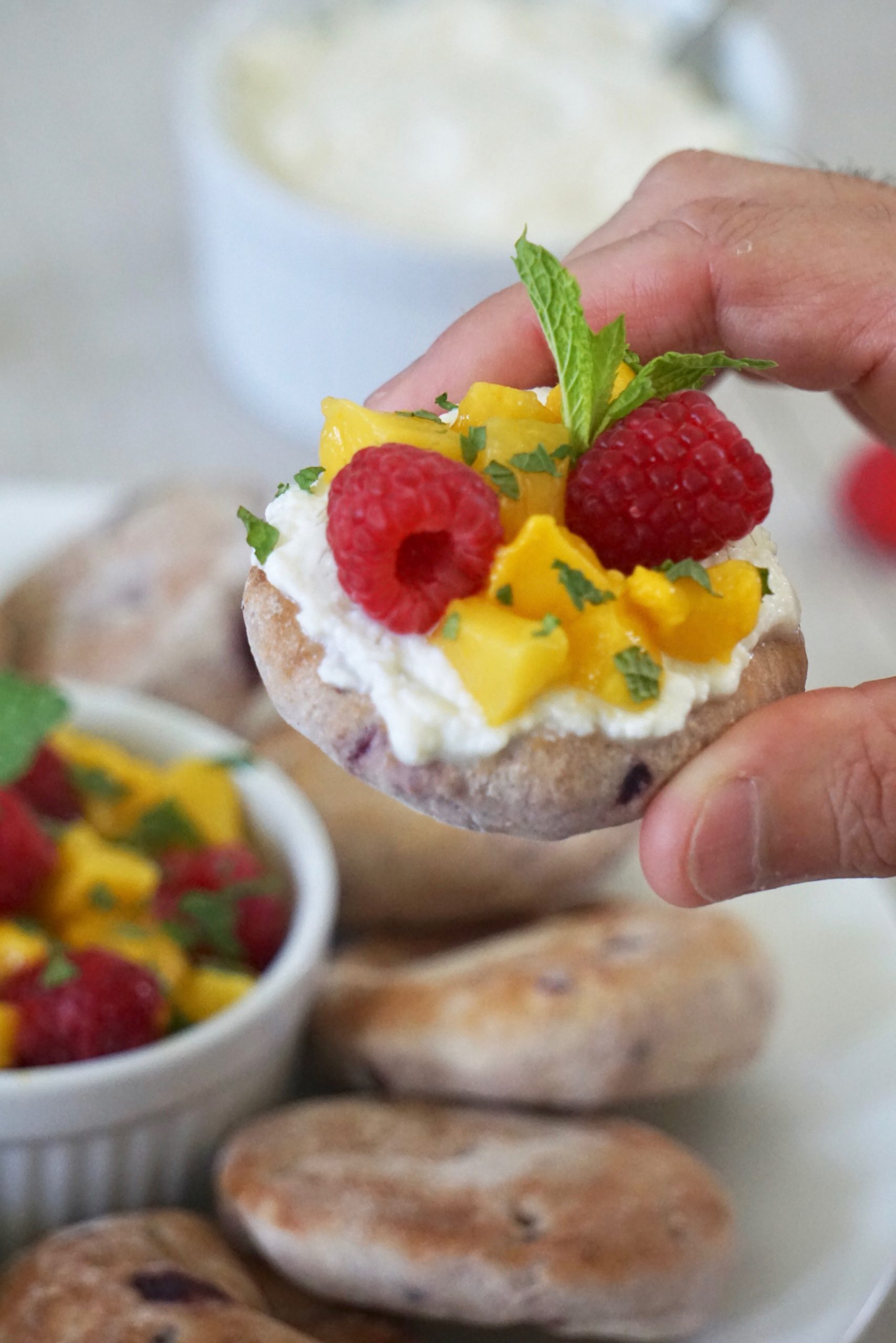 Ricotta toast with raspberry and mango