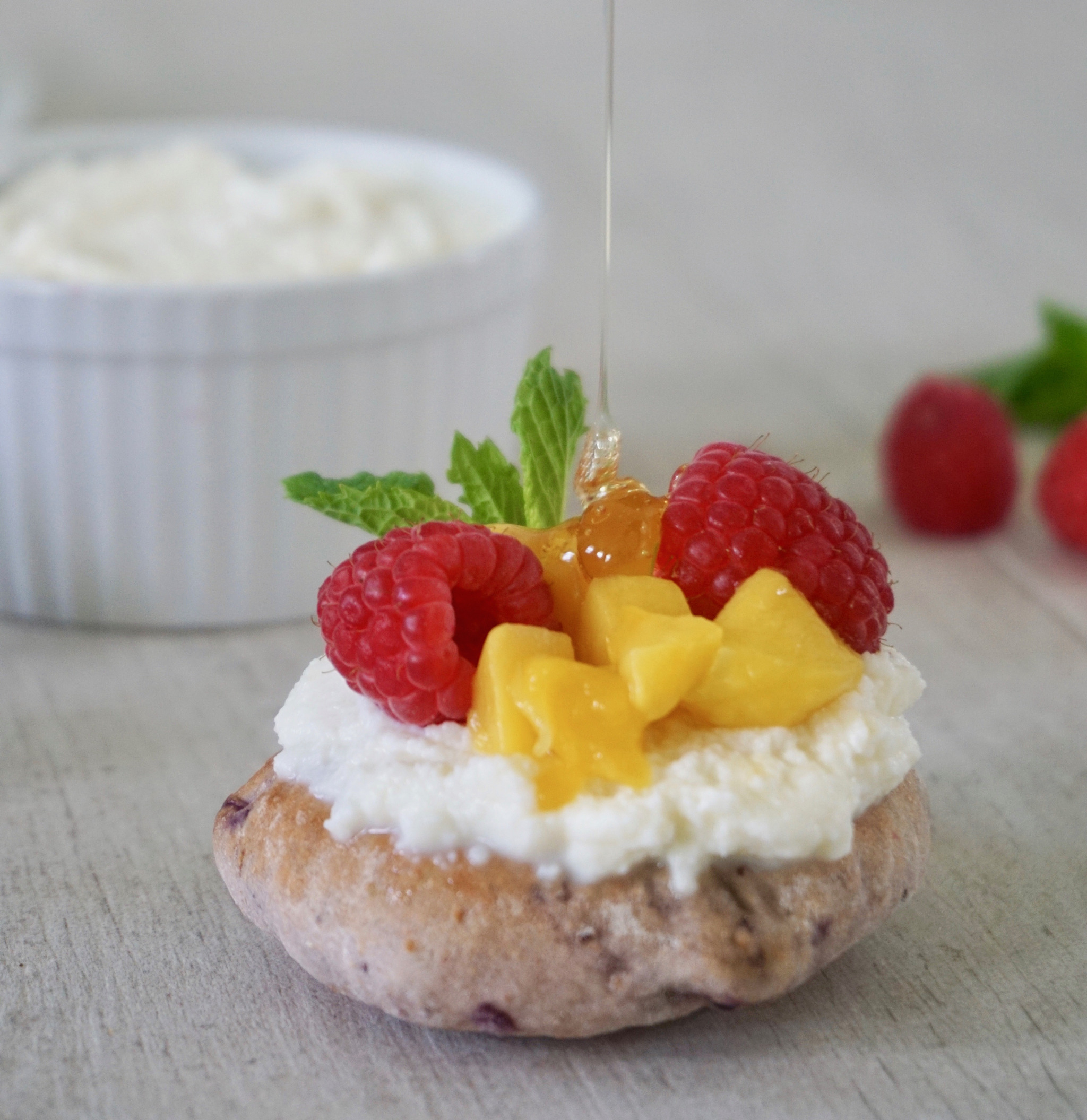 Ricotta toast with raspberry and mango