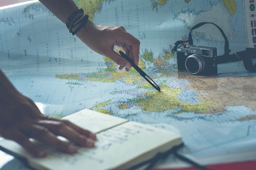making travel plans on a world map
