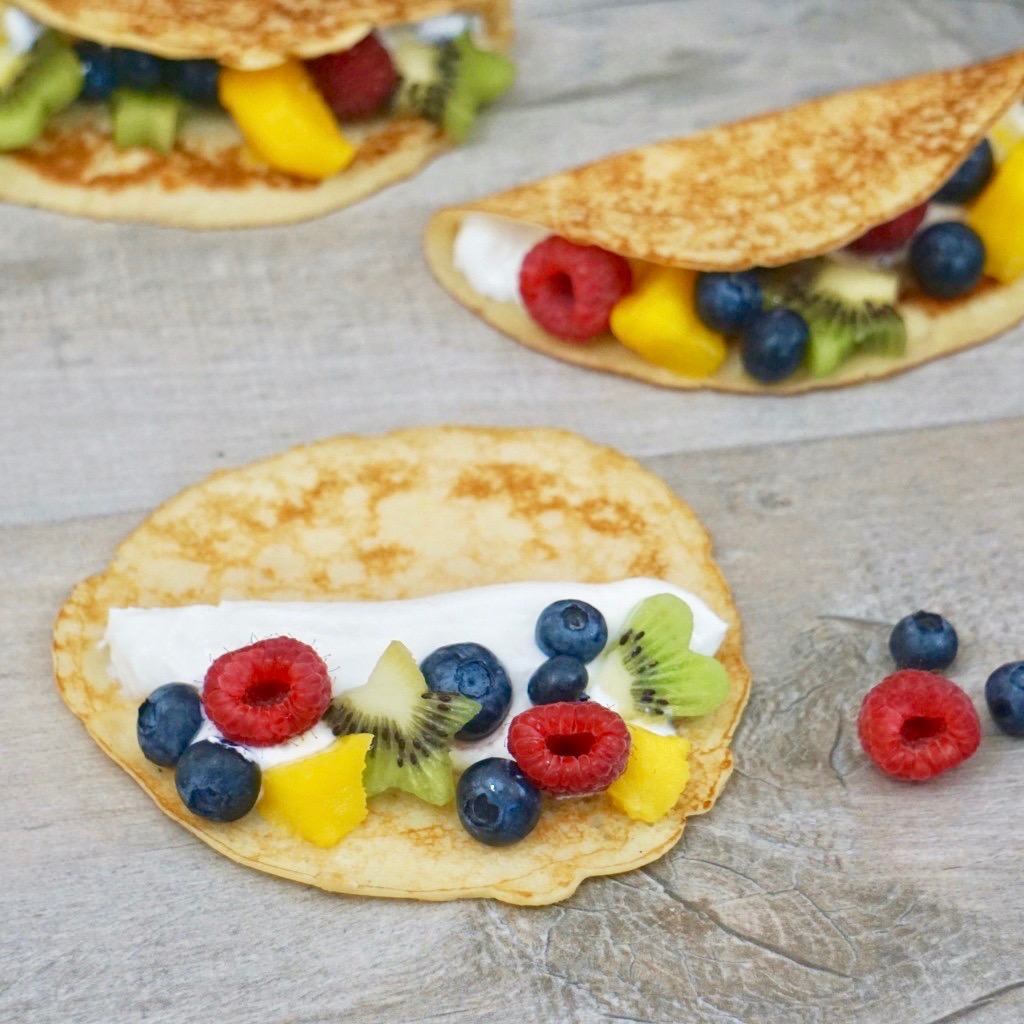 Yogurt and fruit crepe breakfast tacos