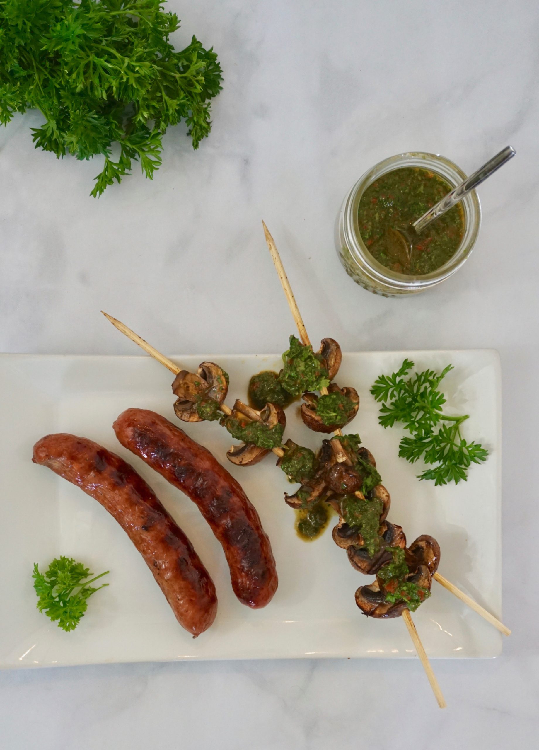 A Perfect Pairing for the Grill: BBQ Brats and Mushrooms with Chimichurri Sauce