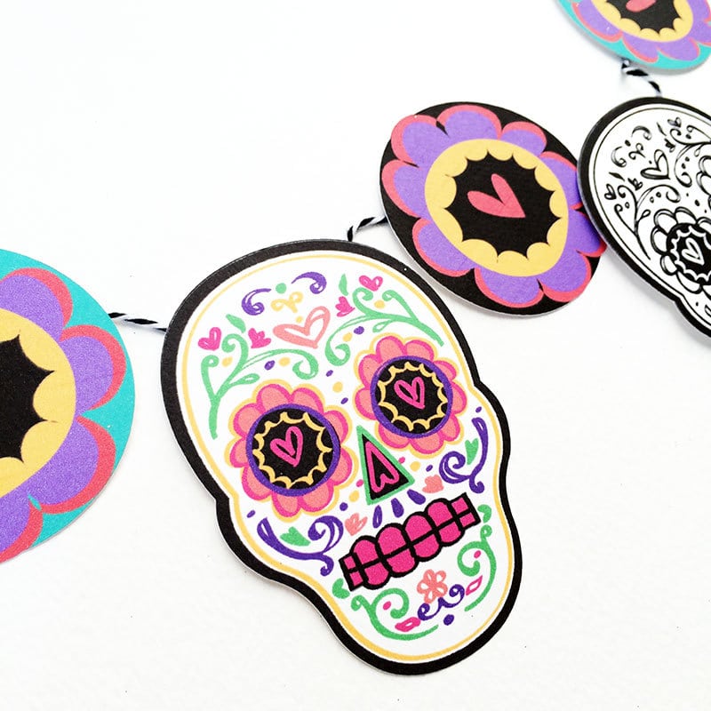 Sugar skull banner and other Cricut Day of the Dead projects with free SVG files