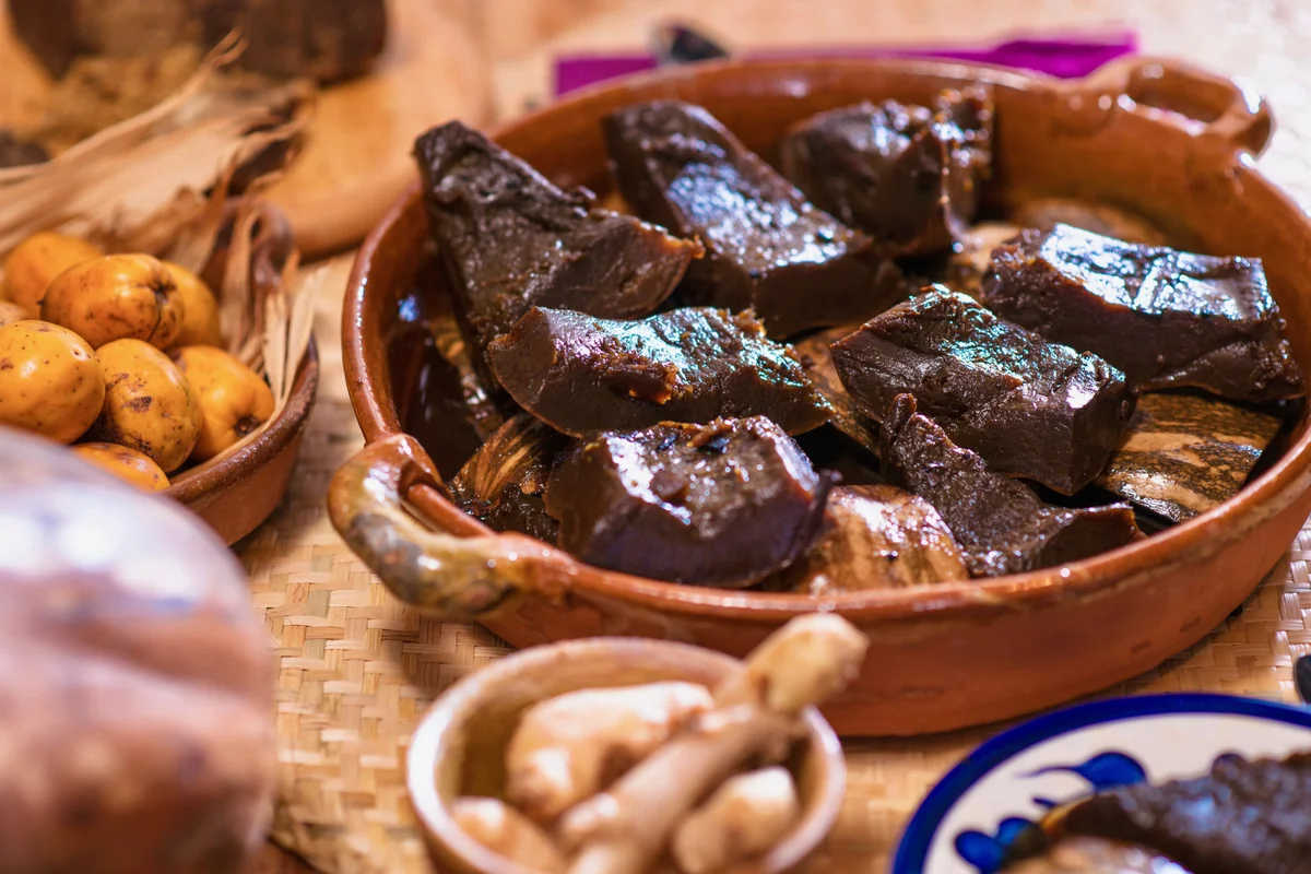 Ayote en miel served in a clay dish with panela syrup