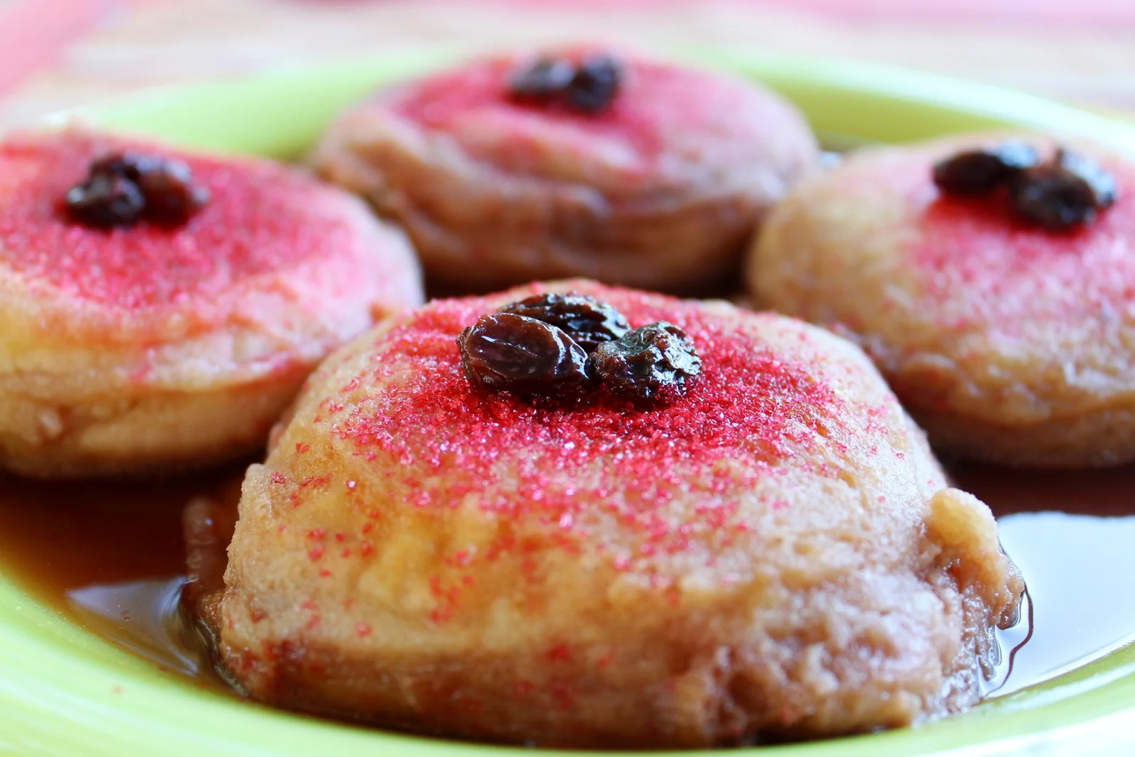 Guatemalan molletes, custard-stuffed sweet bread in panela syrup