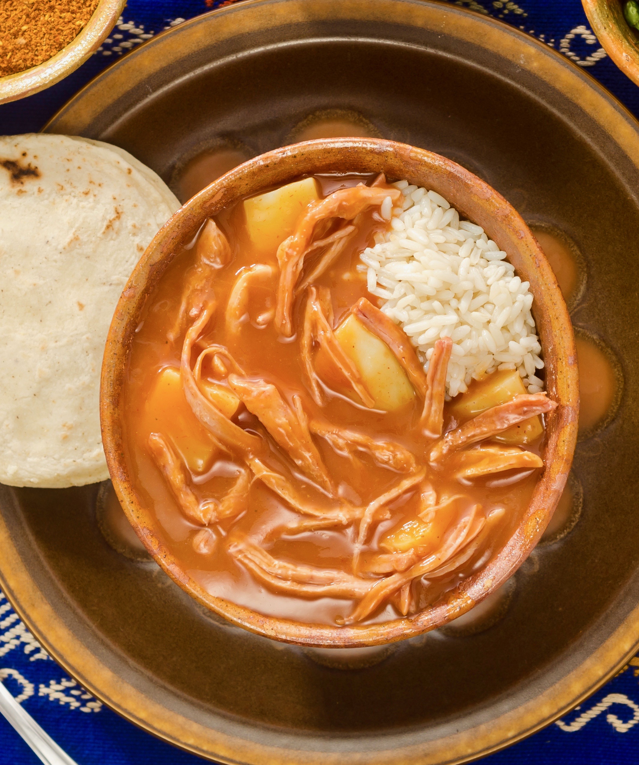 (Hilachas) traditional dish of Guatemalan cuisine, rice, potatoes, tomato sauce and tortillas.