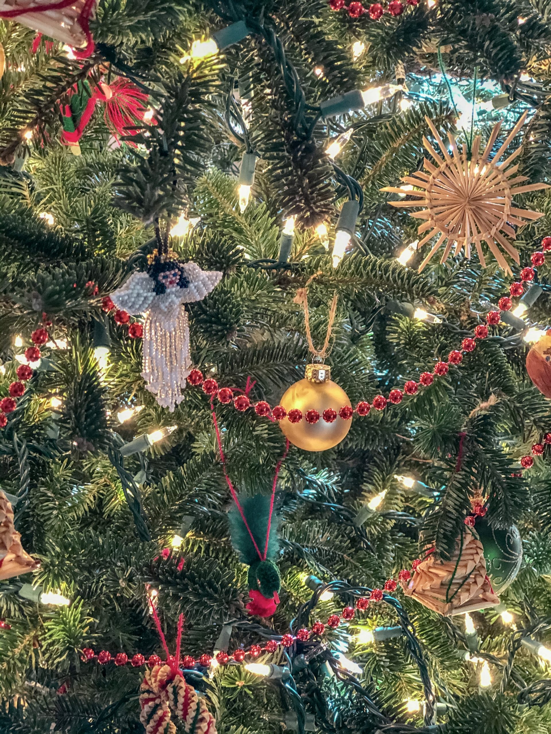 Guatemalan Christmas traditions tree with Guatemalan handmade Christmas ornaments