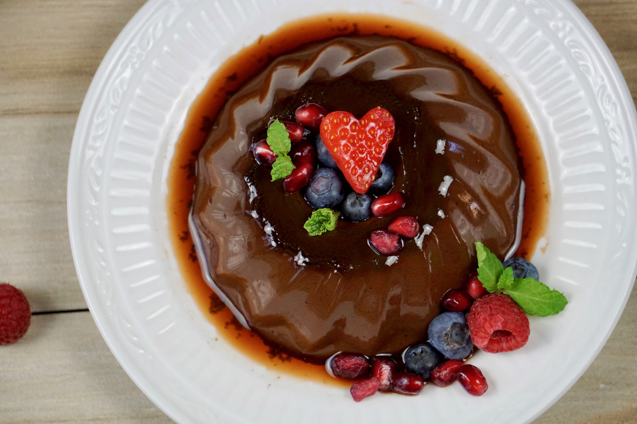 Chocolate flan with fresh berries