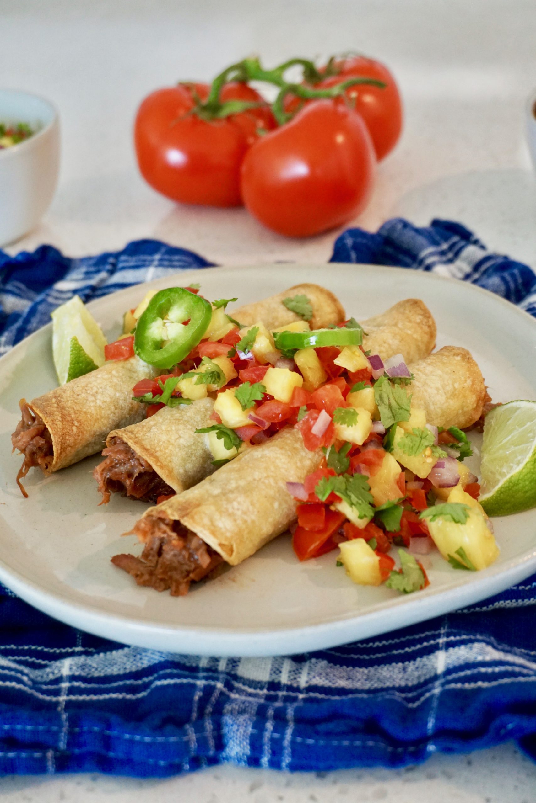 Pulled pork taquitos with pineapple salsa
