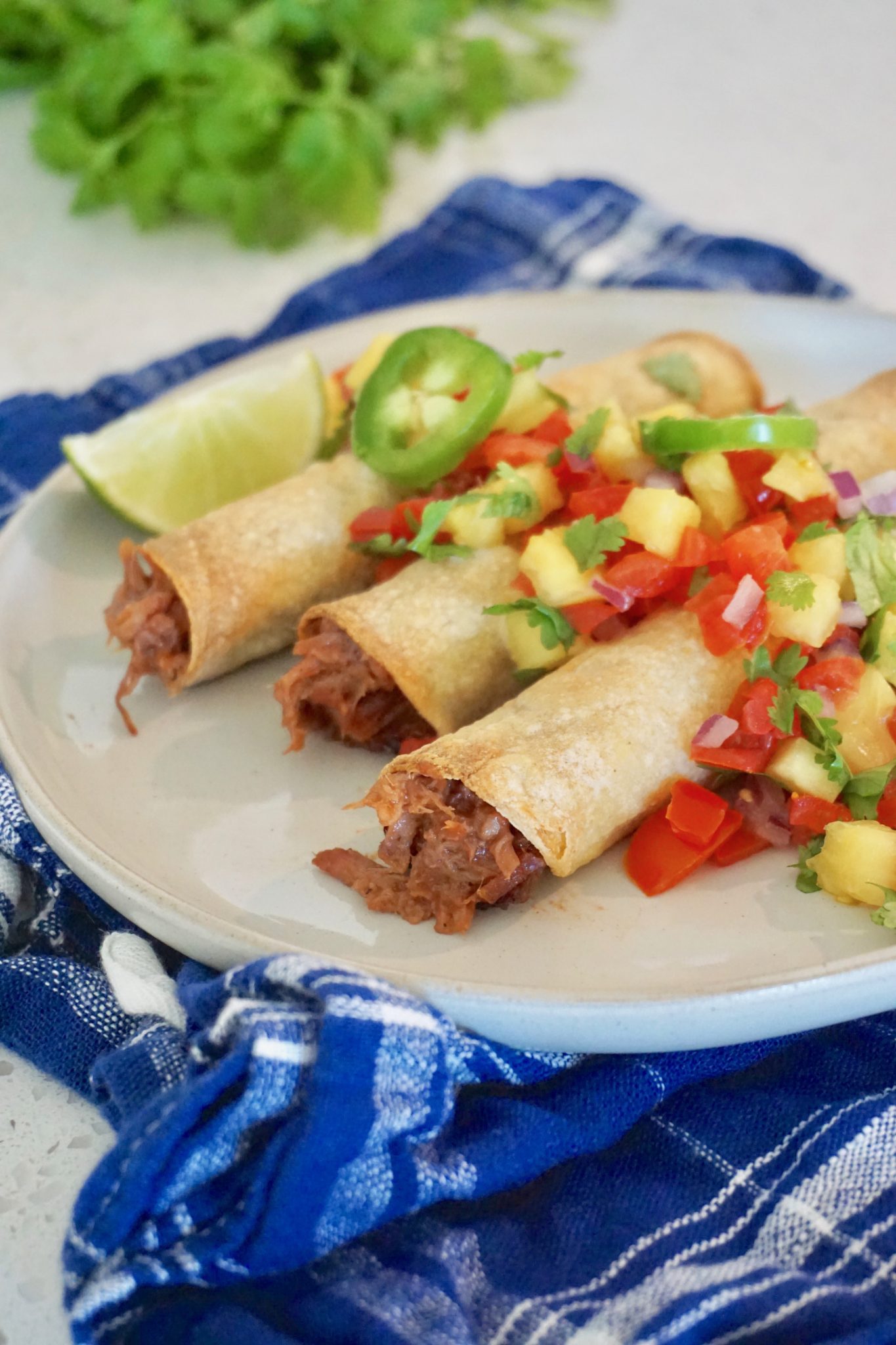 Mexican Pulled Pork Taquitos with Pineapple Salsa