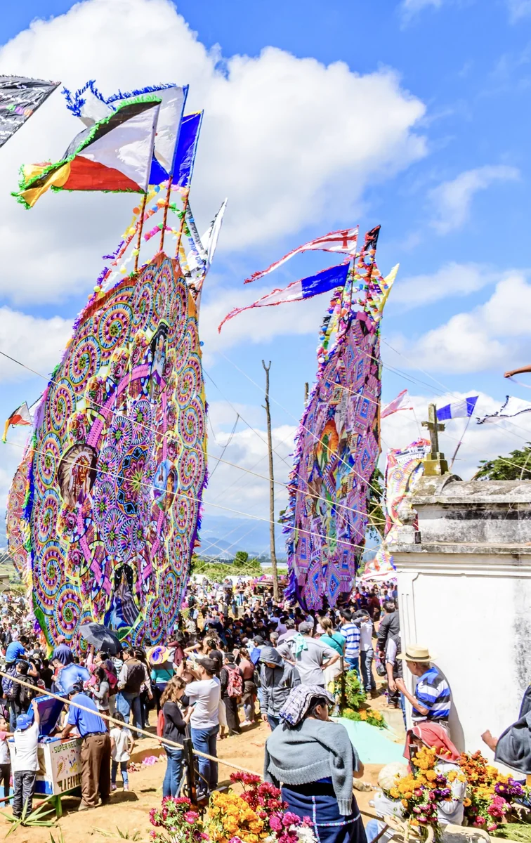 A giant handmade kite decorated with intricate tissue-paper designs