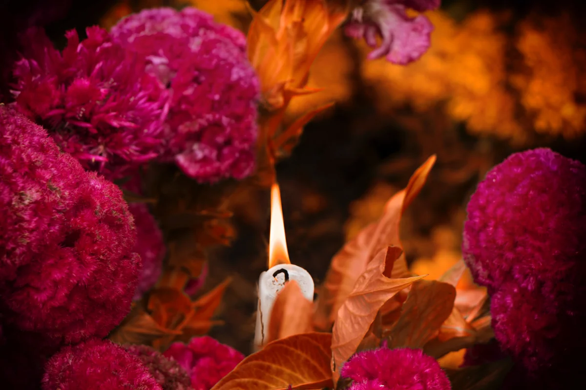 Marigolds and candles to decorate Day of the Dead offerings