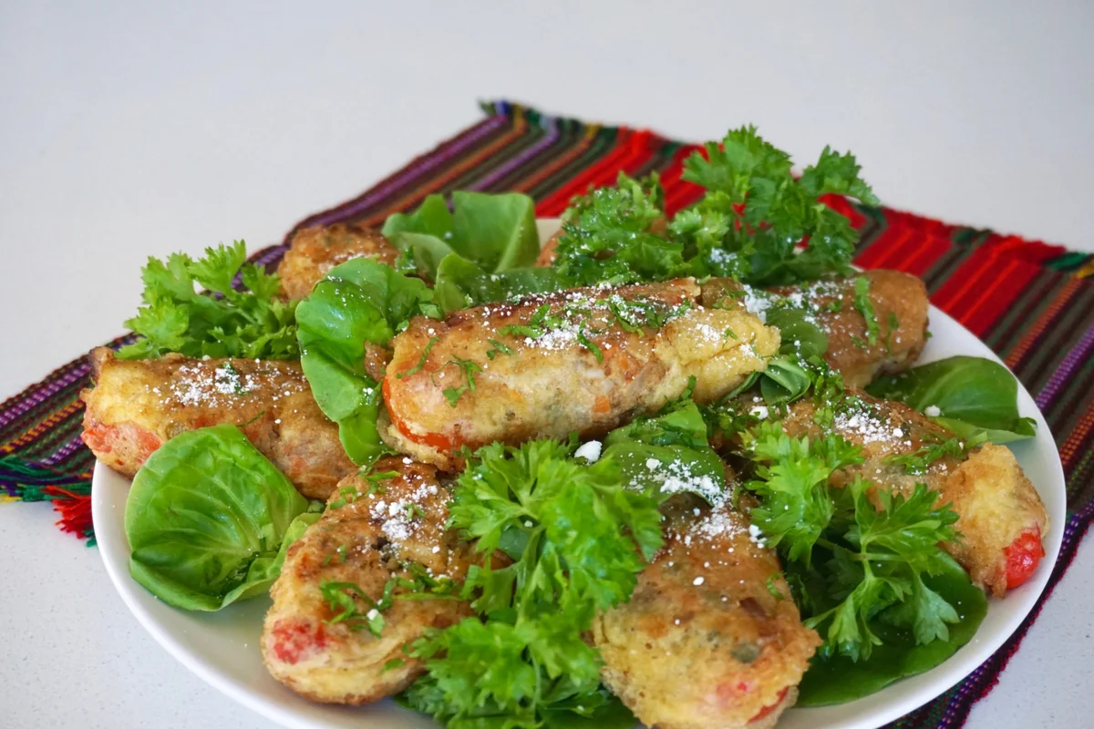 Guatemalan chiles rellenos, stuffed peppers battered in egg
