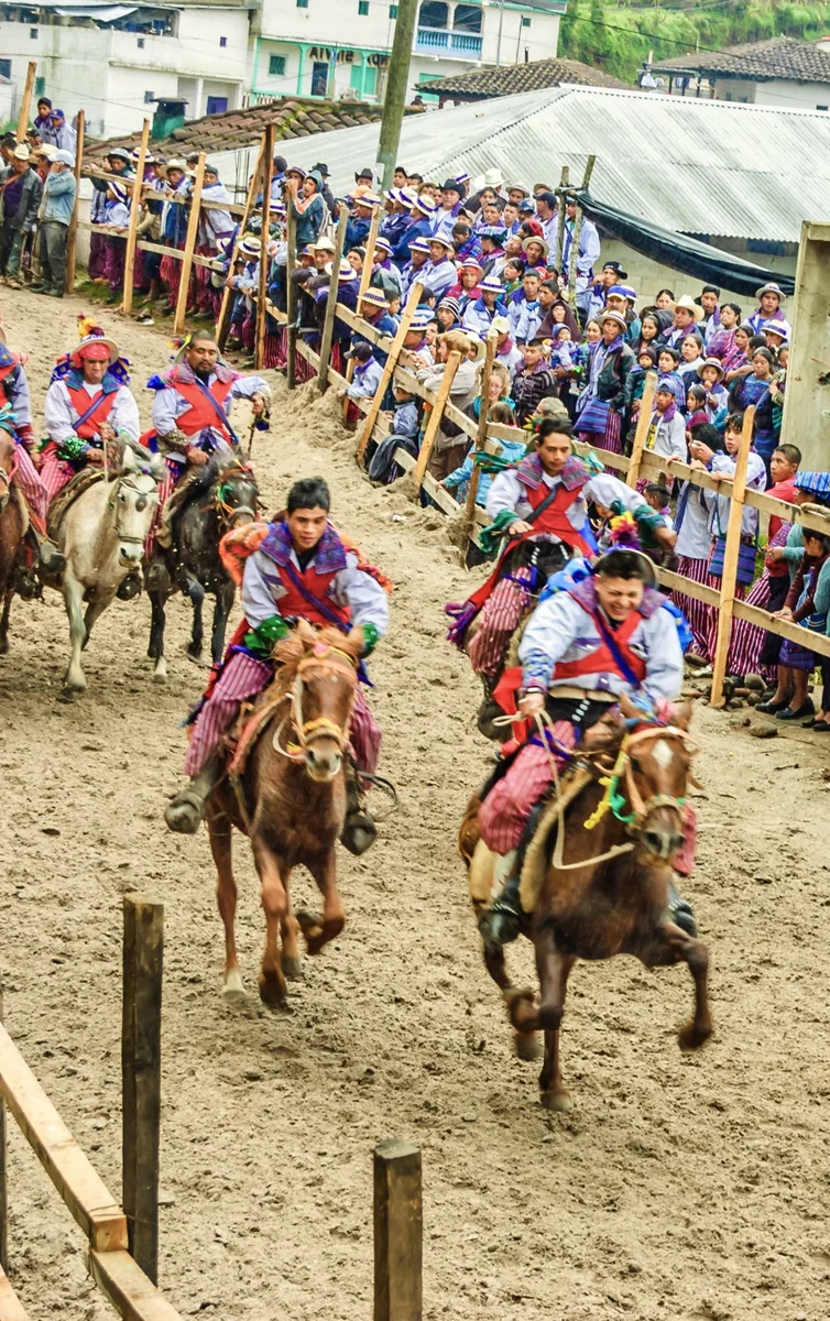A rider on horseback during the traditional Todos Santos Cuchumatán race