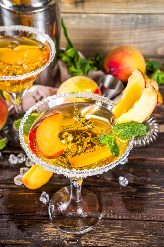Tropical Peach and mango martini cocktail