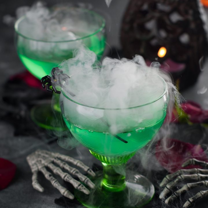 Green Zombie Halloween Cocktail with dry ice