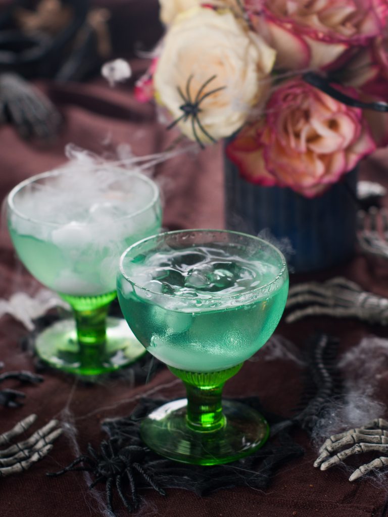 Green Zombie Halloween Cocktail with dry ice