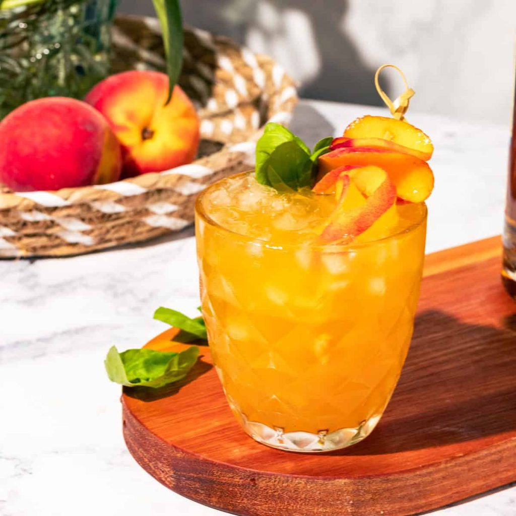 Basil Peach Bourbon Smash and best peach cocktails