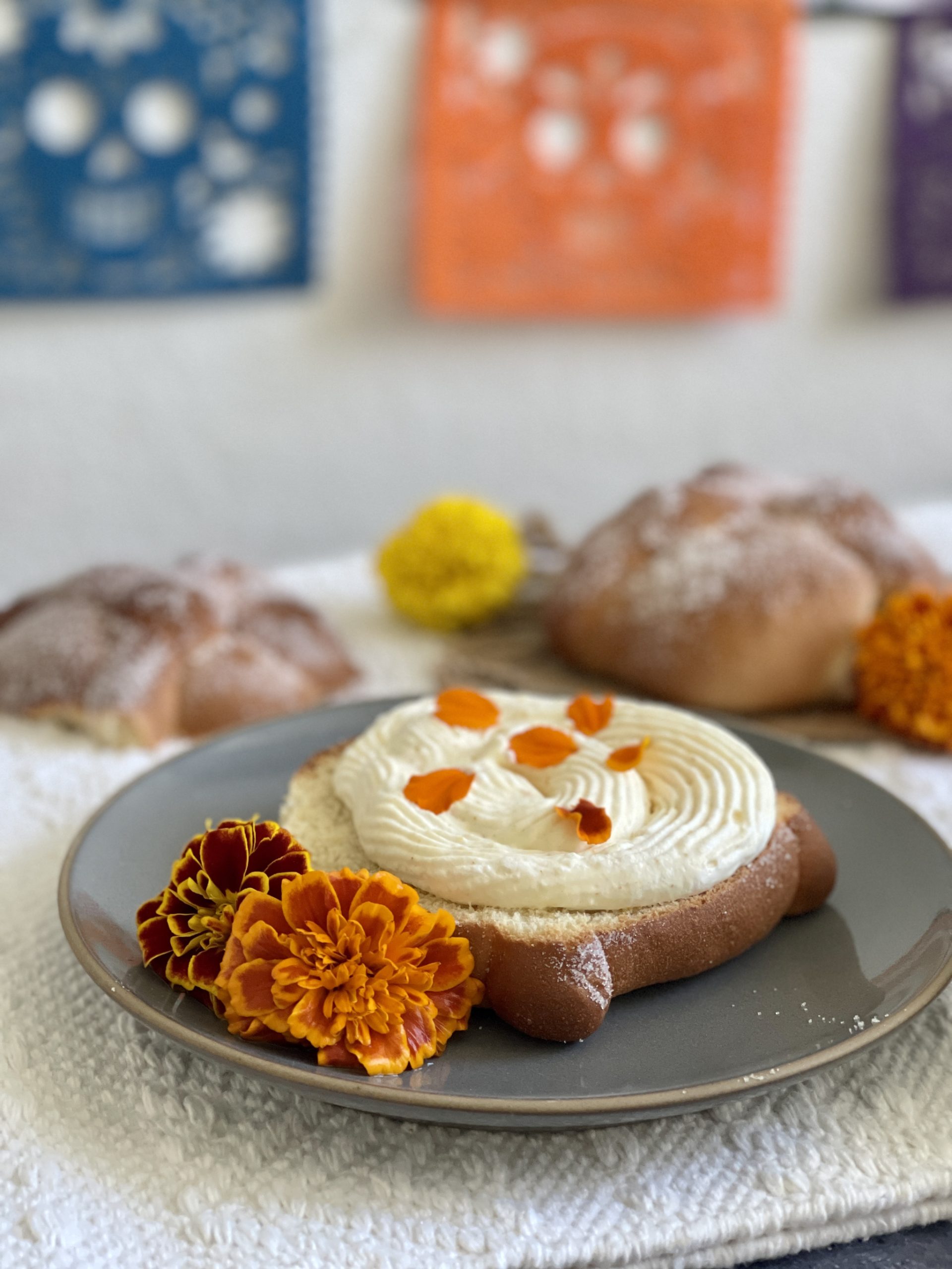 Pan de muerto stuffed with marigold cream