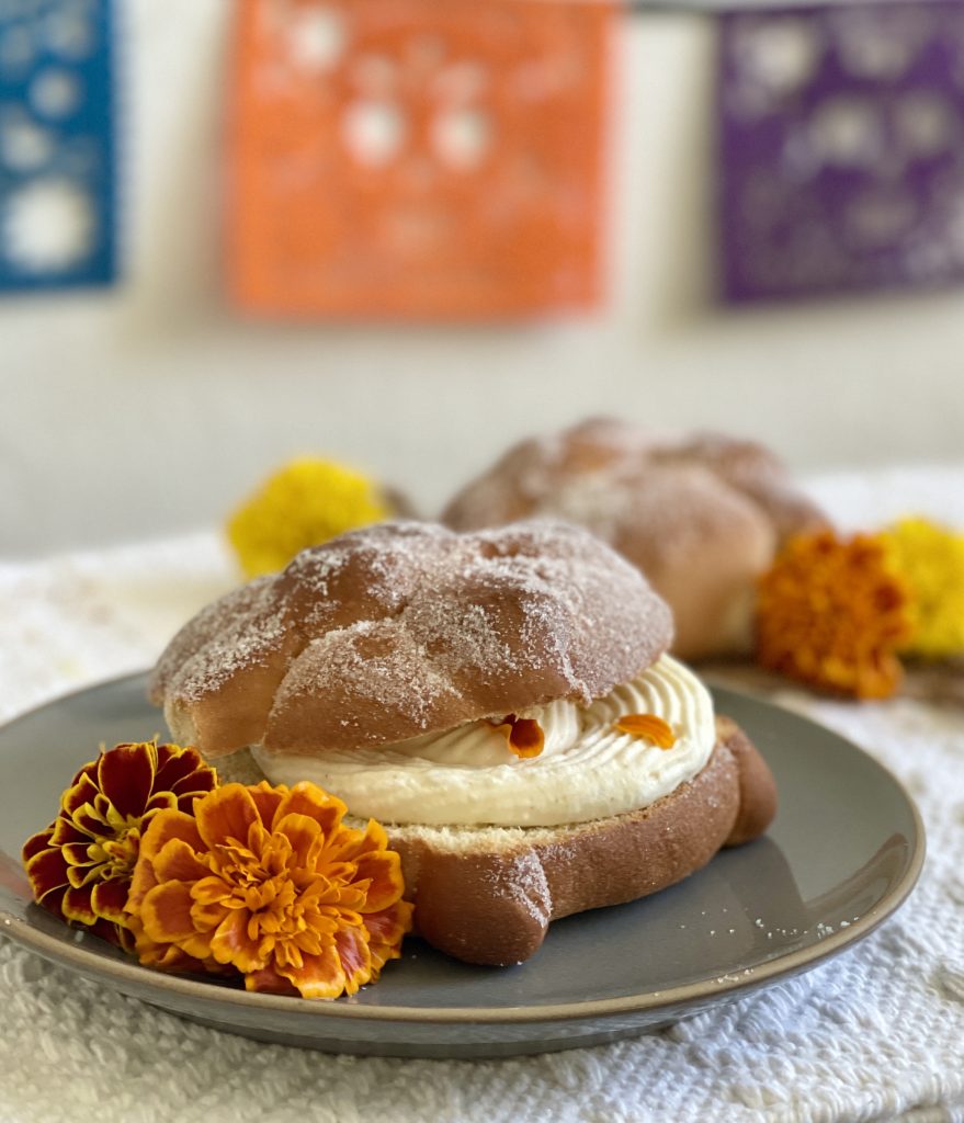 Cempasuchil (marigold) cream filled pan de muerto