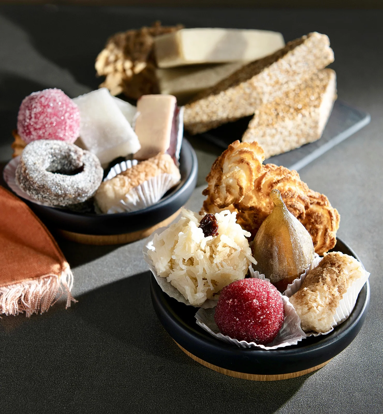 Traditional Guatemalan candy including marzipan fruits, colochos and canillitas de leche