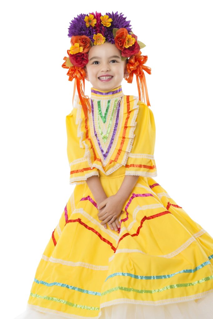 Traditional Mexican dress with flowers in the hair