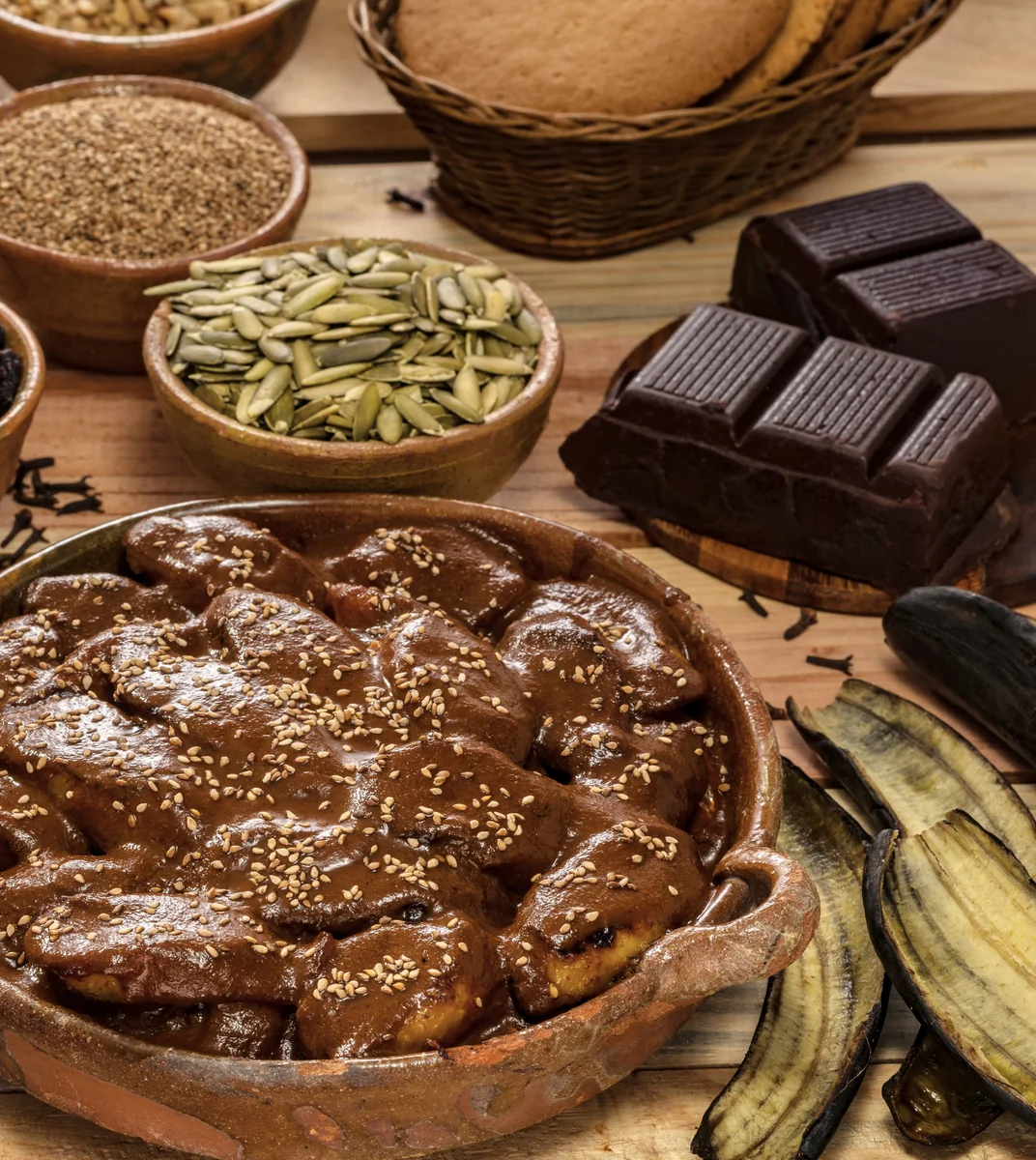 Fried plantains in dark chocolate mole sauce, a Guatemalan dessert
