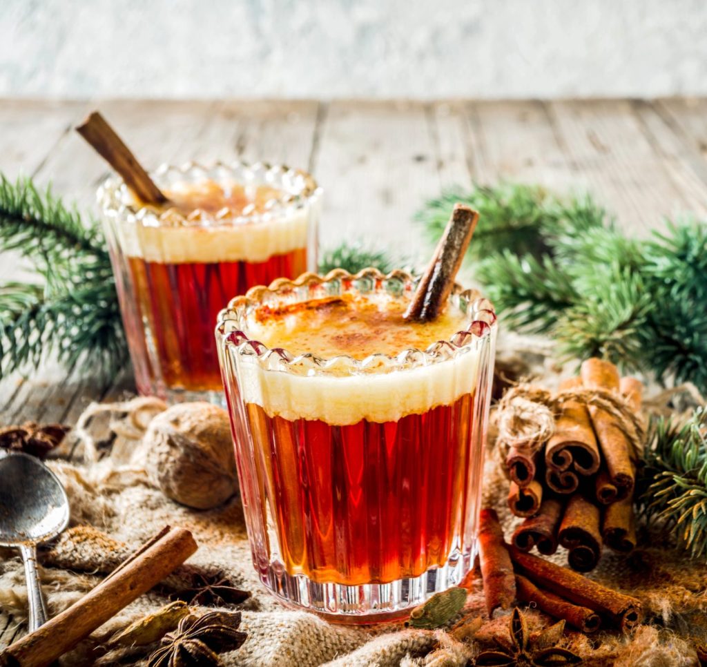 This traditional hot buttered rum recipe is a warming winter cocktail made with dark rum, butter, cinnamon, and nutmeg. A cozy holiday drink that’s perfect for cold nights.
