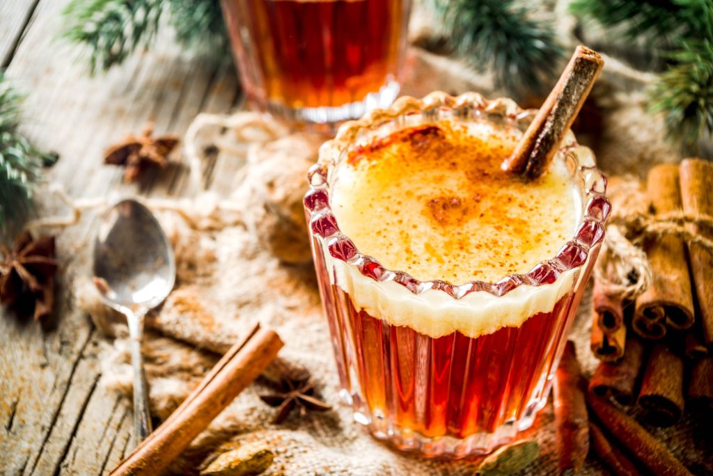 A festive hot buttered rum recipe topped with warm spices and served hot. This classic winter cocktail is made with dark rum, butter, and cinnamon for a comforting holiday drink.