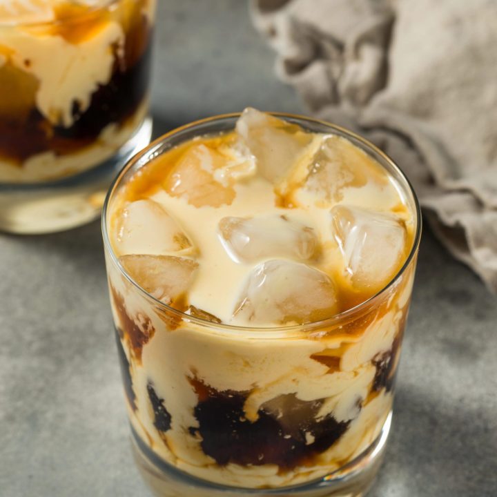 Christmas eggnog White Russian cocktail recipe served in a rocks glass with ice