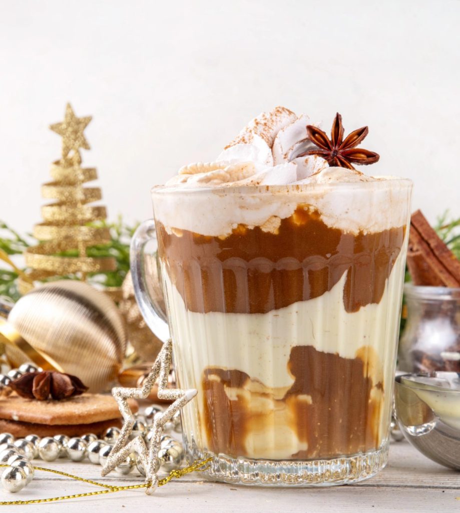 This easy recipe for eggnog affogato cocktail has layers of hot espresso, eggnog ice cream, and bourbon topped with whipped cream and warm spices. This holiday ice cream cocktail recipe works as both a dessert and a Christmas cocktail.