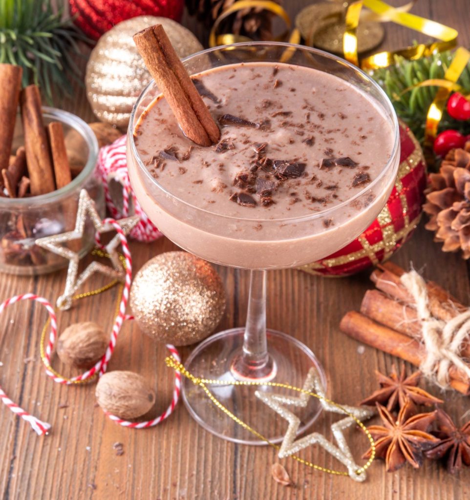Easy chocolate eggnog martini recipe with grated chocolate, a festive Christmas martini and holiday dessert cocktail