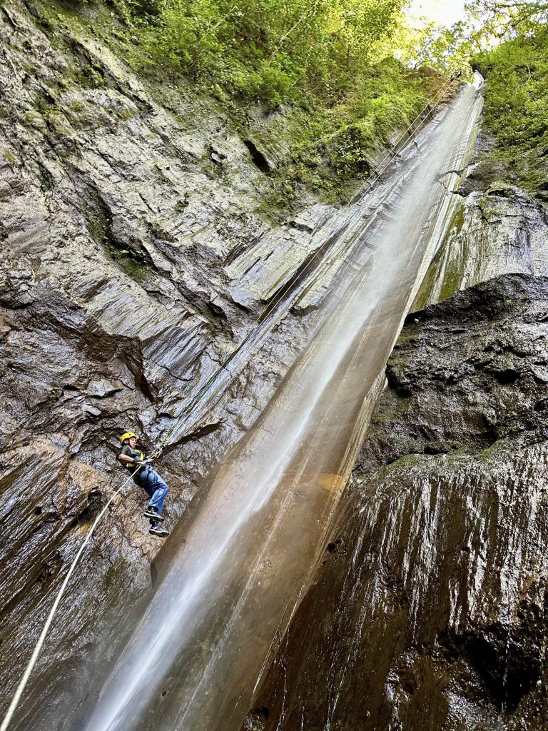 Rappelling down a 150 foot waterfall at Finca El Barretal near Antigua Guatemala