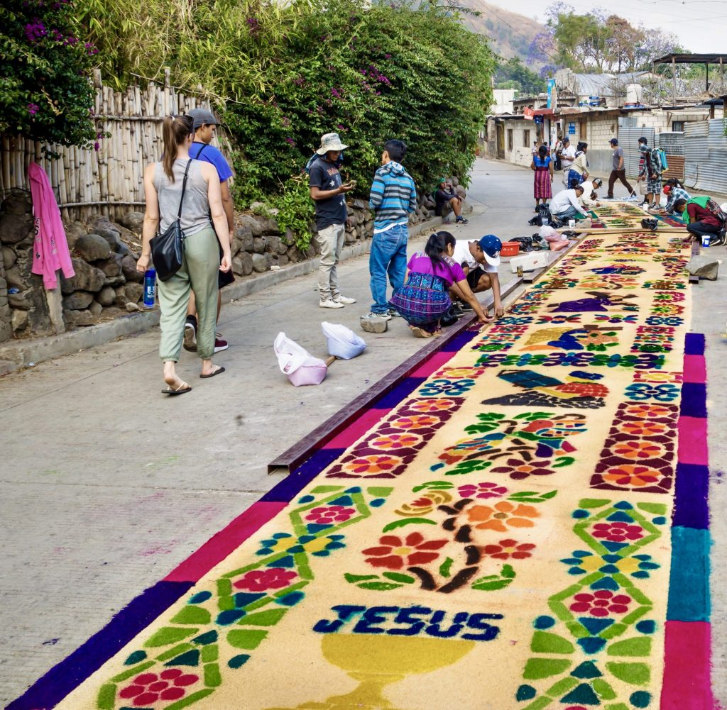 Families create a stunning colored sawdust alfombra in San Marcos La Laguna during Semana Santa — everything you need to know about Holy Week at Lake Atitlán Guatemala in our complete village by village guide