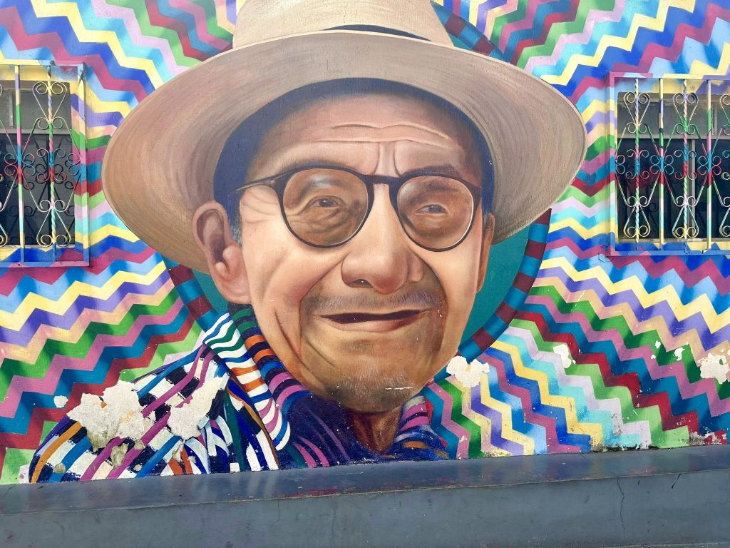 Colorful portrait mural in San Juan La Laguna Guatemala