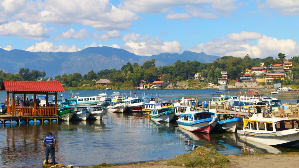 Traditional boats docked along the waterfront in Santiago Atitlán Guatemala