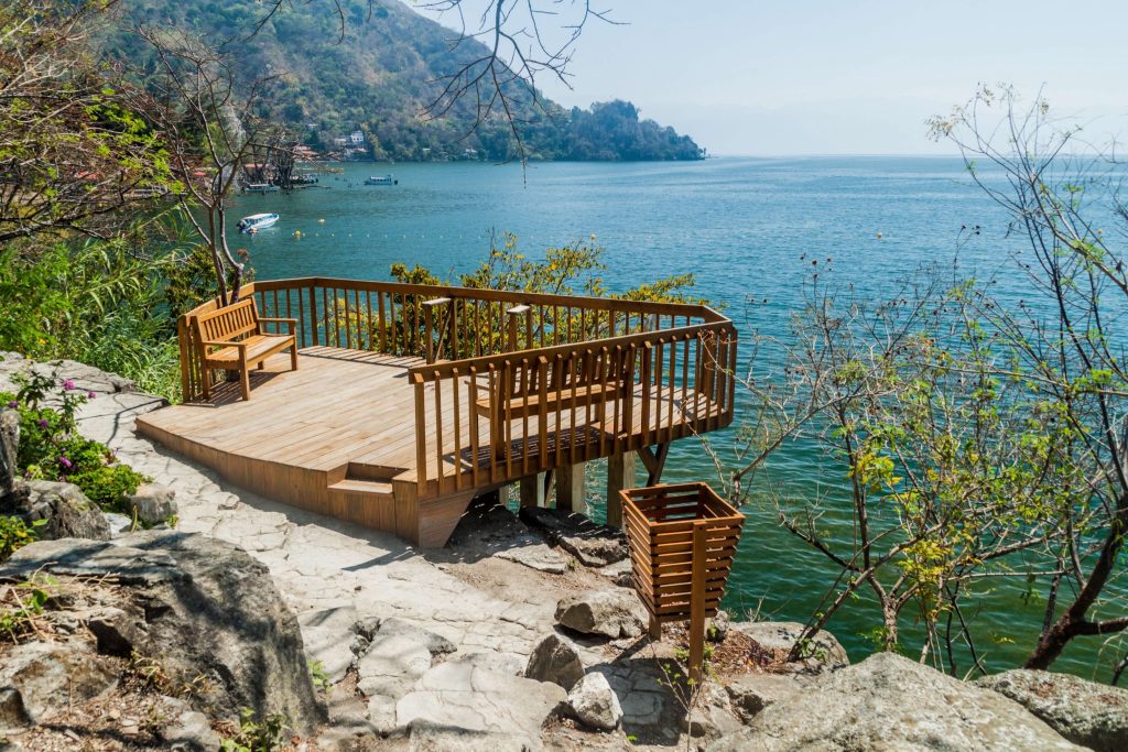 Wooden lakeside viewing platform at Reserva Natural Cerro Tzankujil in San Marcos La Laguna Guatemala