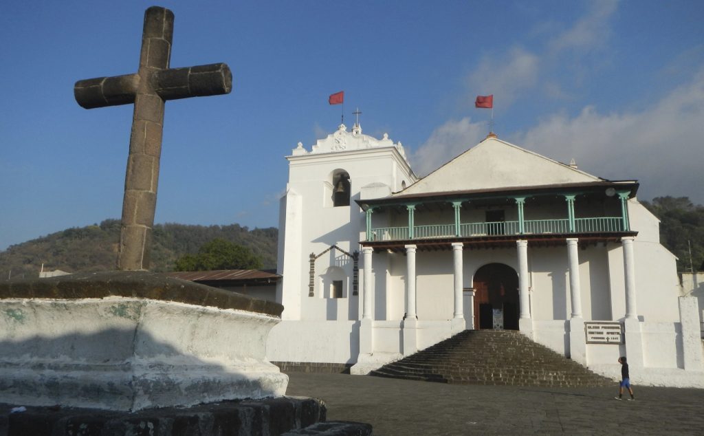 Colonial church and cross in the central plaza of Santiago Atitlán Guatemala