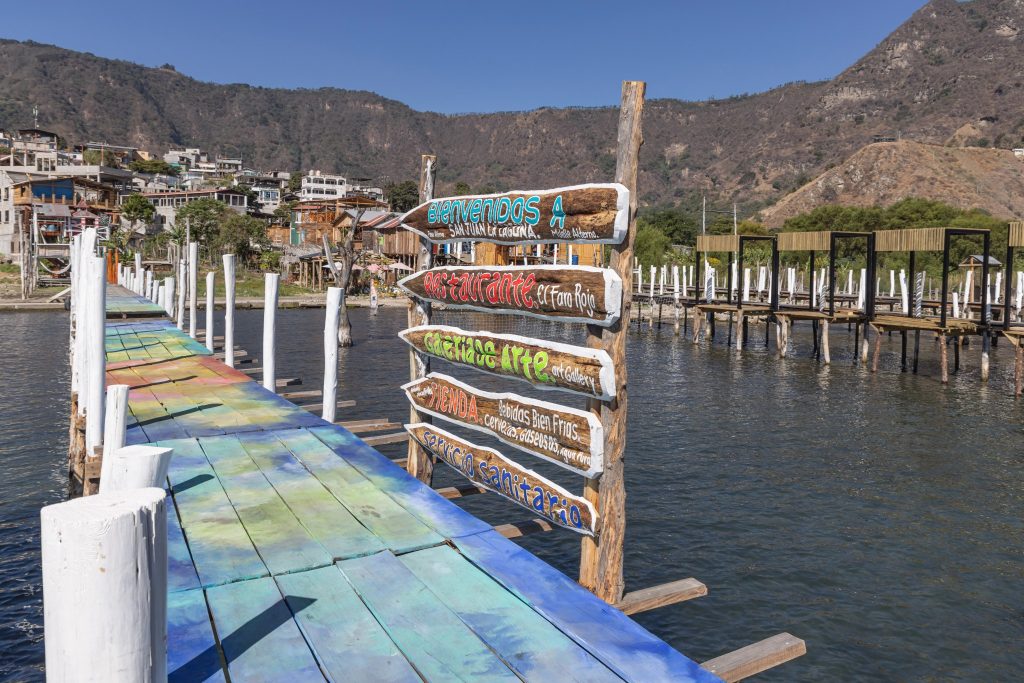 Colorful dock and welcome sign in San Juan La Laguna Guatemala