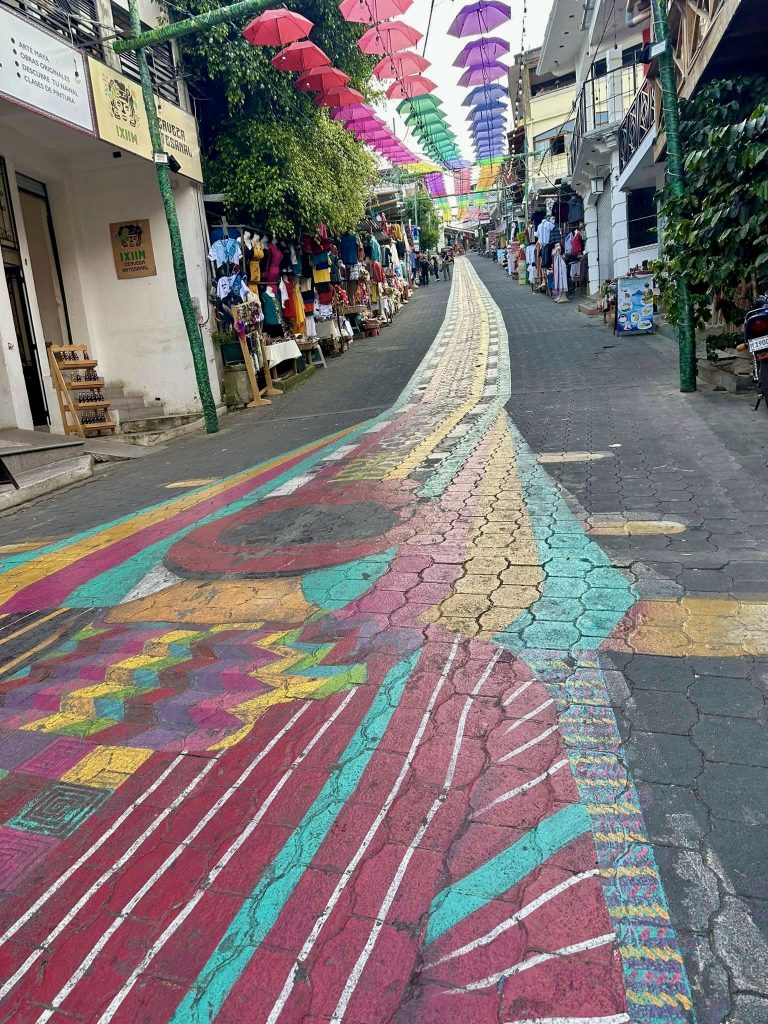 Colorful painted street and umbrella street in San Juan La Laguna Guatemala