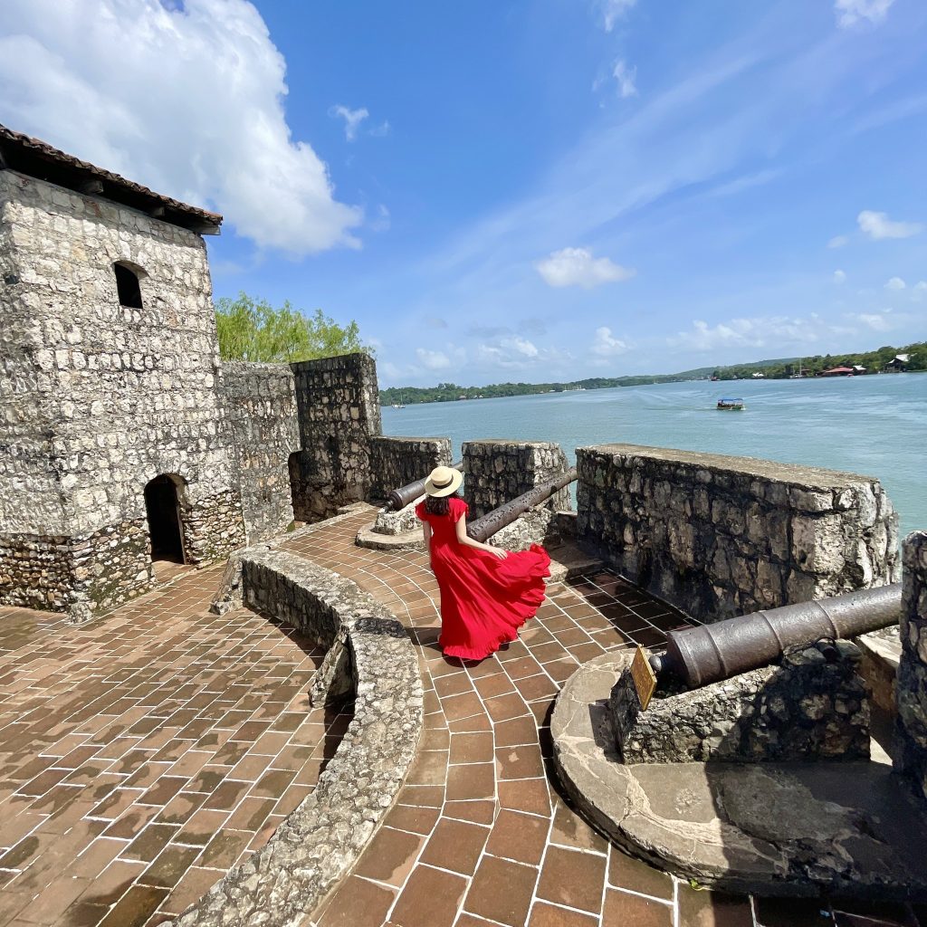 Stone walls and cannons inside Castillo de San Felipe de Lara overlooking Lake Izabal in Guatemala.