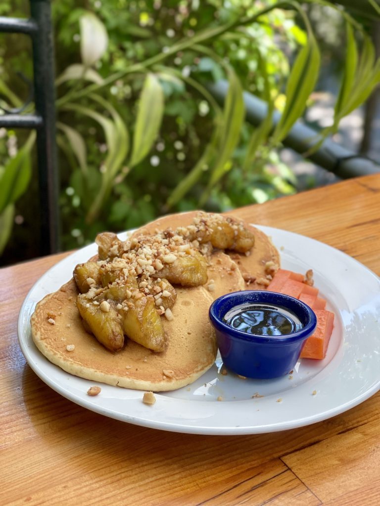 Gluten-free macadamia flour pancakes with caramelized banana at Valhalla Macadamia Farm near Antigua Guatemala
