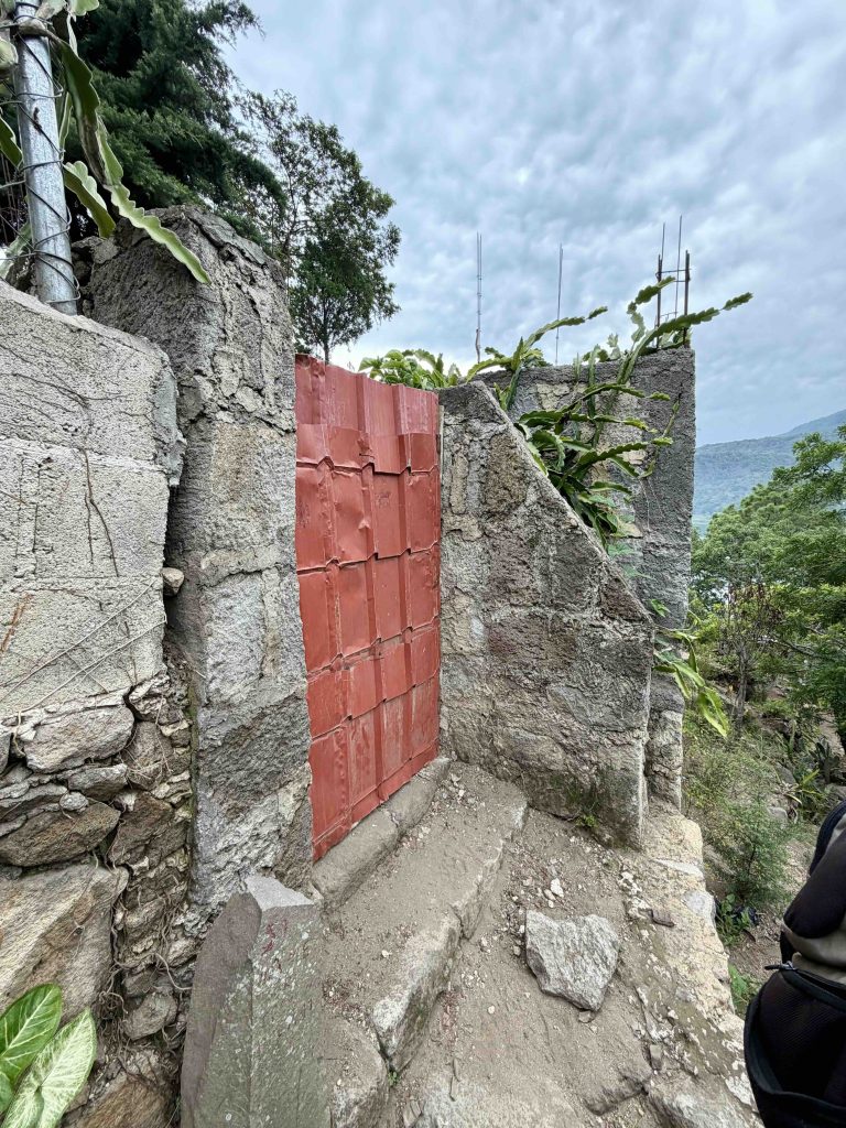 What to expect when visiting Chuitinamit Guatemala, including the locked entrance to the private archaeological collection near Santiago Atitlán