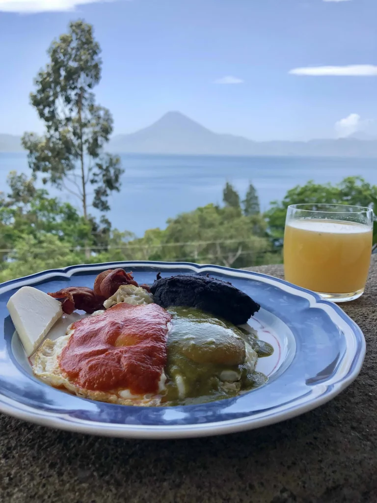 Huevos divorciados breakfast at Casa Palopó overlooking Lake Atitlán and the volcanoes
