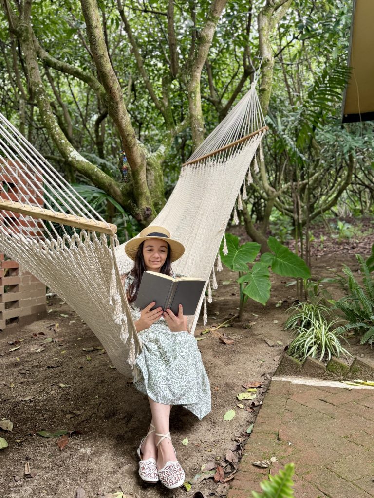 Hammock beneath avocado trees at Orilla Casas en Ati relaxing family Airbnb near Santiago Atitlán Lake Atitlán